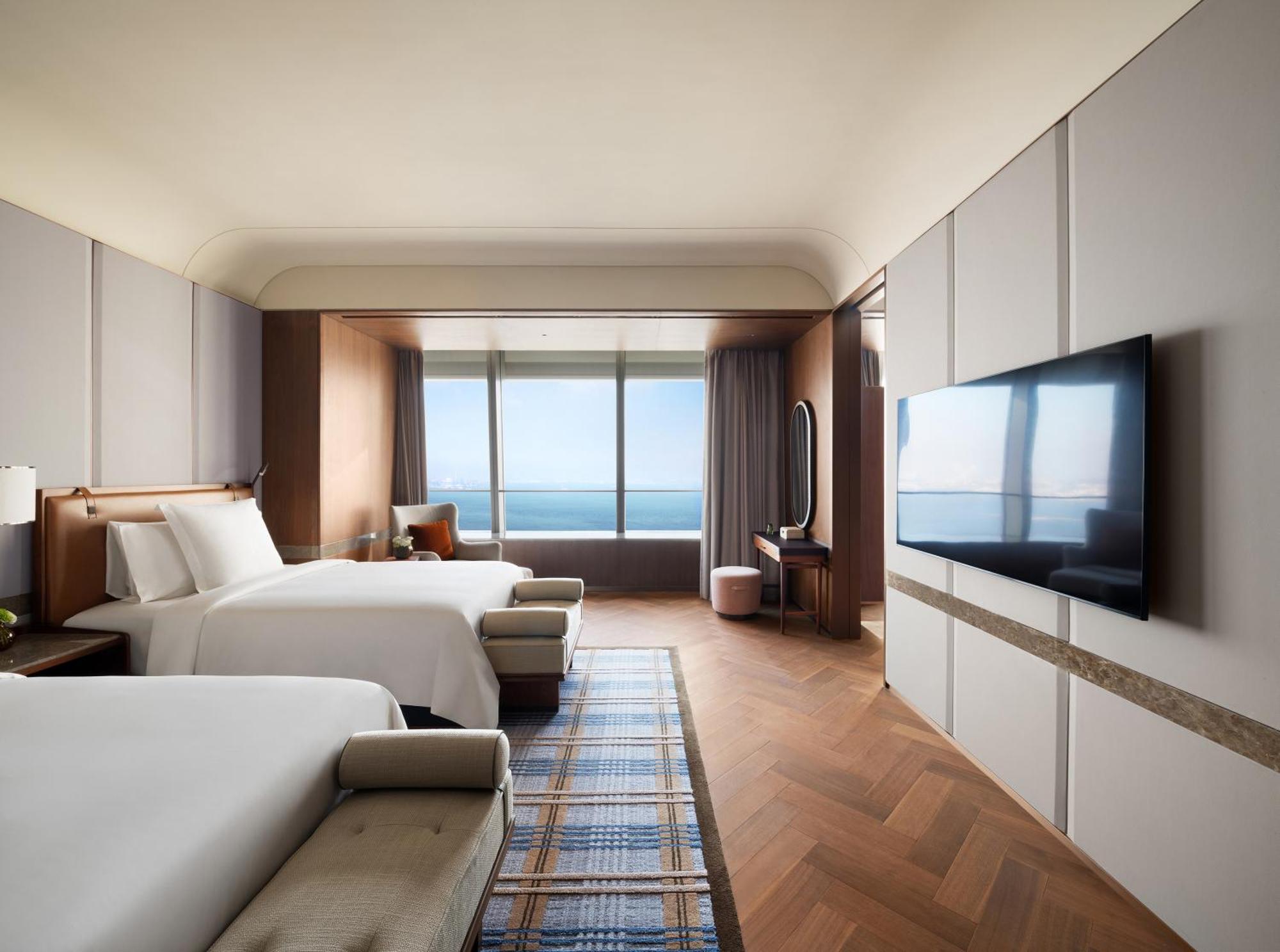 Four Seasons Hotel Далянь Экстерьер фото