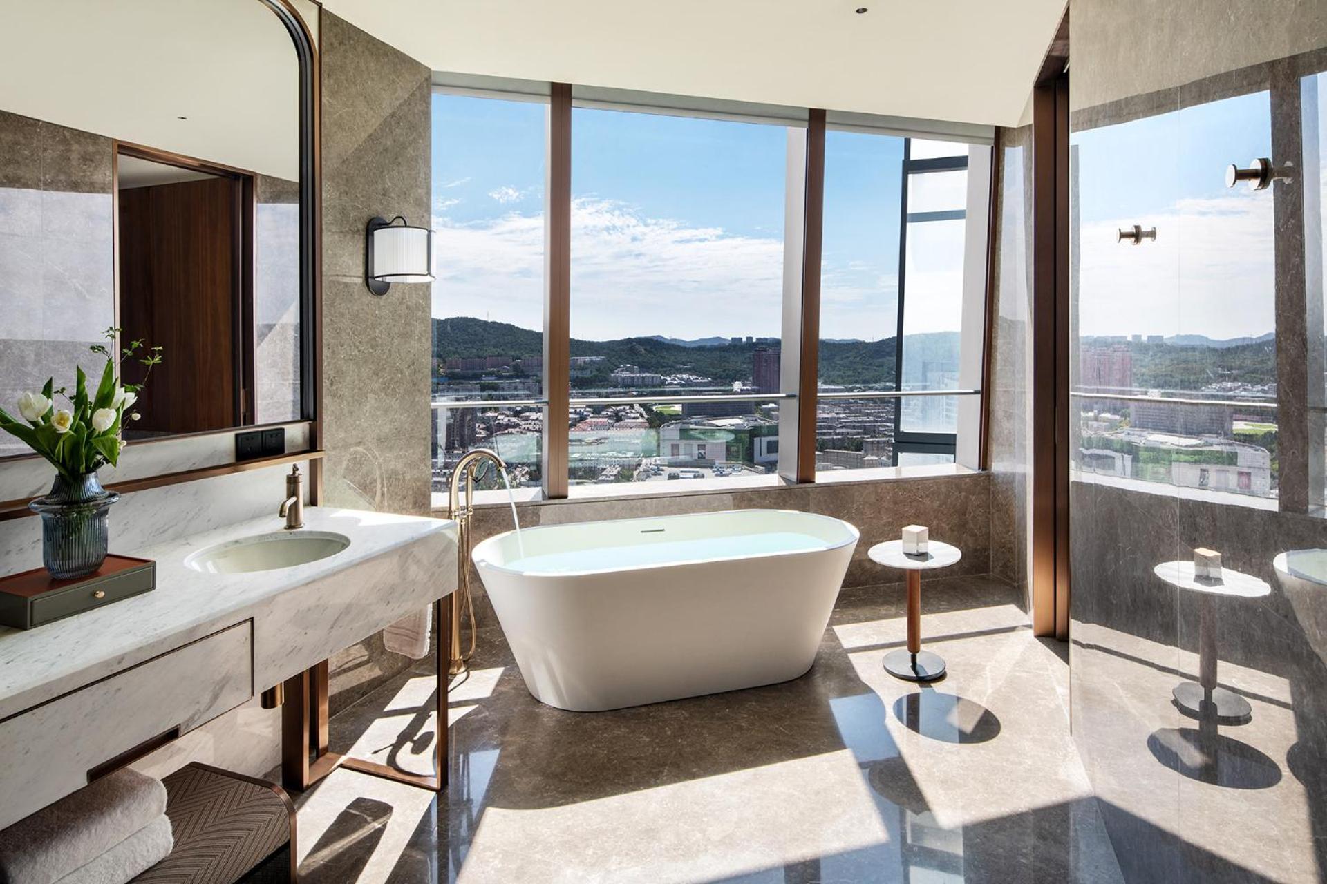 Four Seasons Hotel Далянь Экстерьер фото