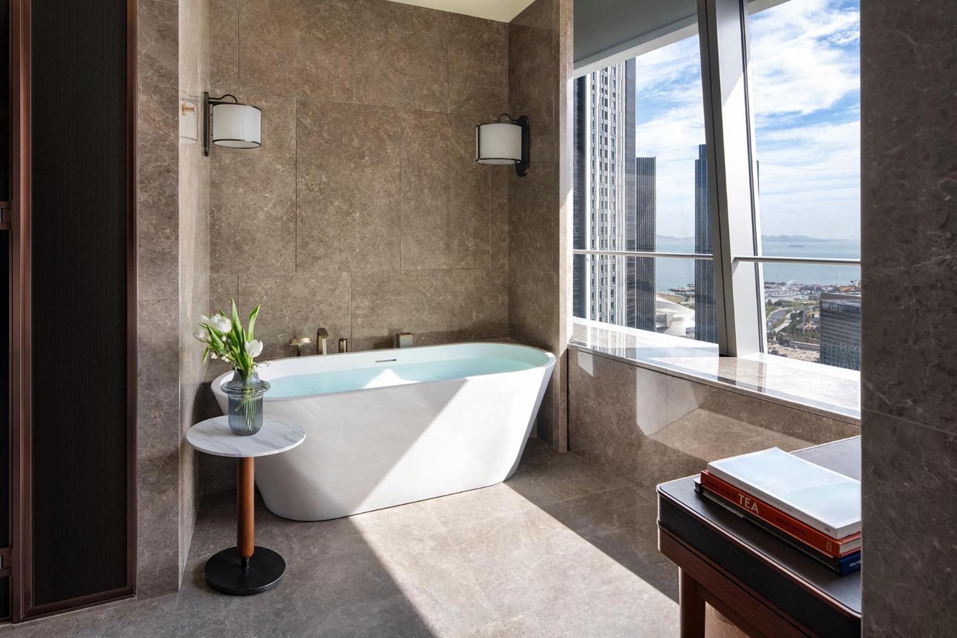 Four Seasons Hotel Далянь Экстерьер фото